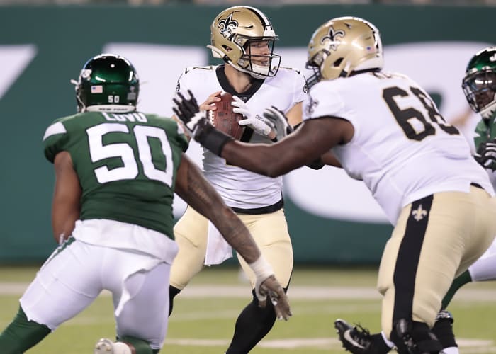 Aug 24, 2019; Jets linebacker Frankie Luvu (50) is blocked by Saints offensive tackle Derrick Kelly (68) during a preseason game. Mandatory Credit: Vincent Carchietta-USA TODAY